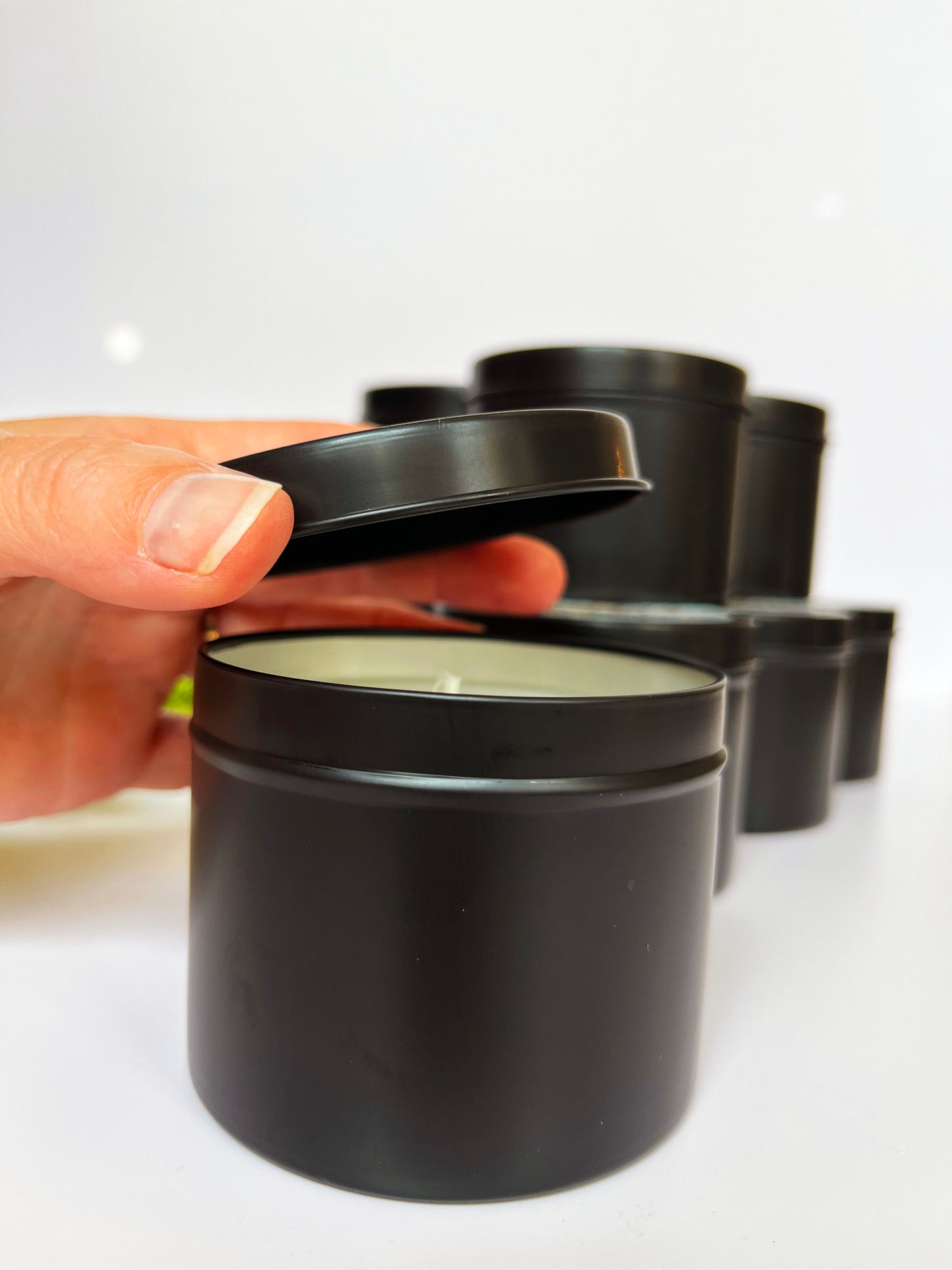 black tin travel candle pretty chic