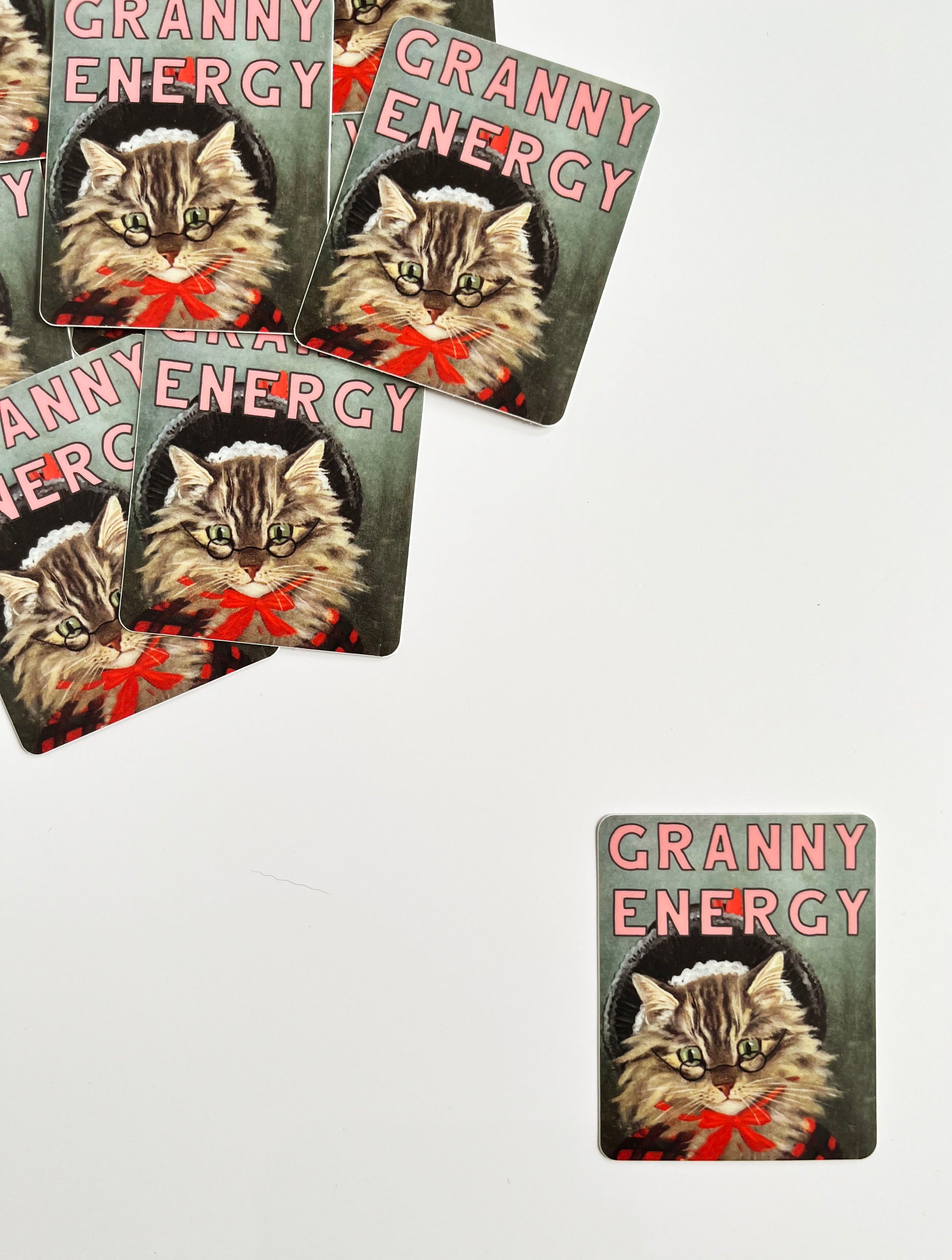 funny sticker text granny energy vintage cat kitty glasses bow hat pink grey gray red brown black high quality durable all purpose vinyl water bottle mug tumbler laptop notebook journal car old lady hobbies sew craft plants garden knit crochet read rocking chair nap fireplace morning person cooking coin laundry montana