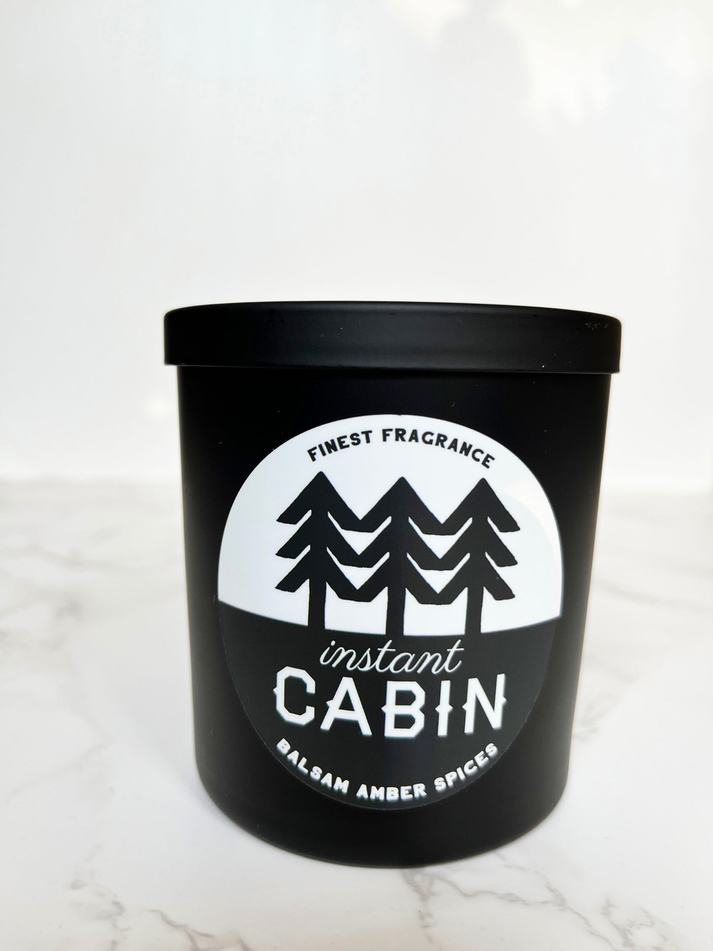 woodland modern trees winter pretty instant cabin candle in black jar modern chic earthy balsam amber cute cozy gift coin laundry