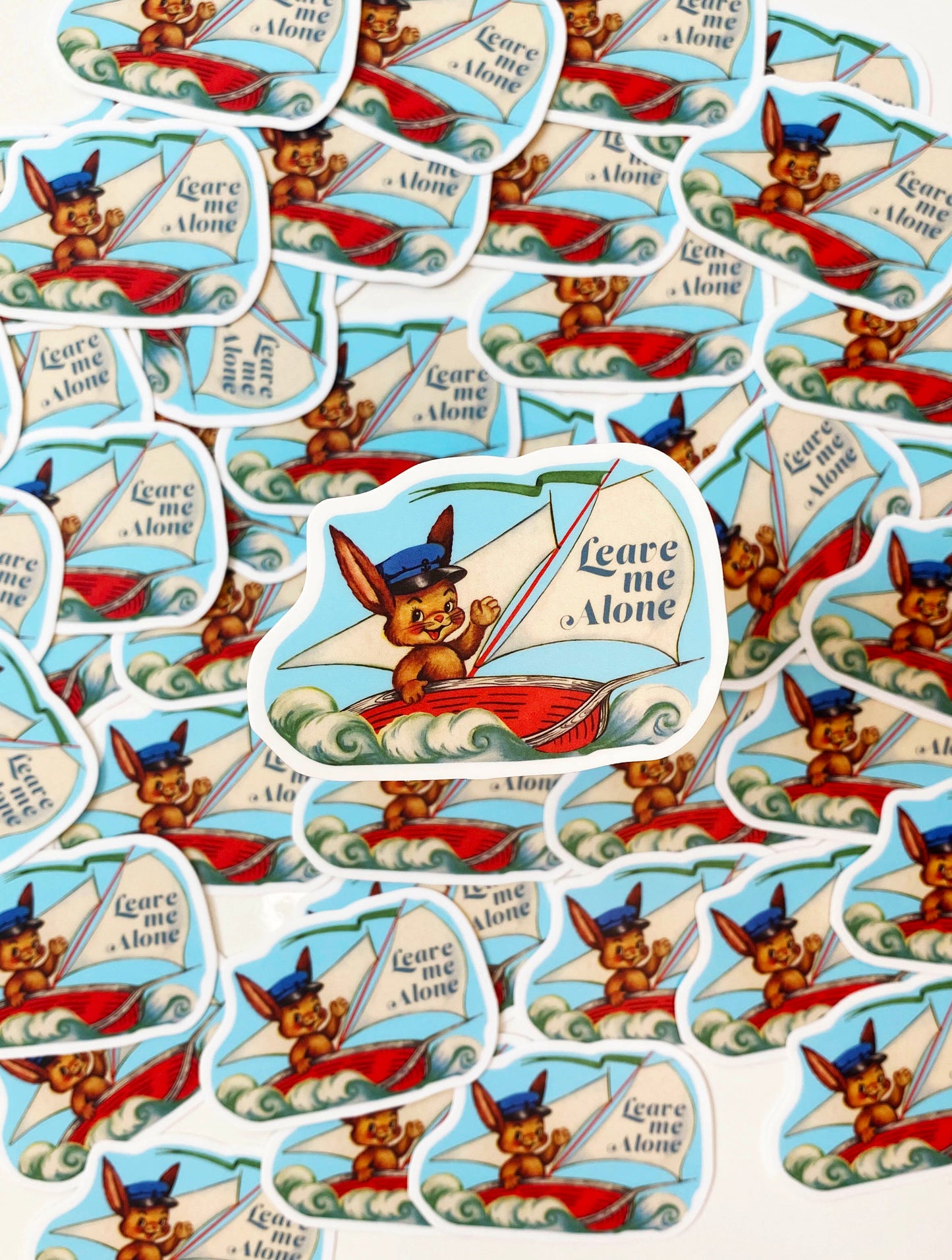 leave me alone sticker bunny in a sailboat with waves snarky stickers coin laundry montana