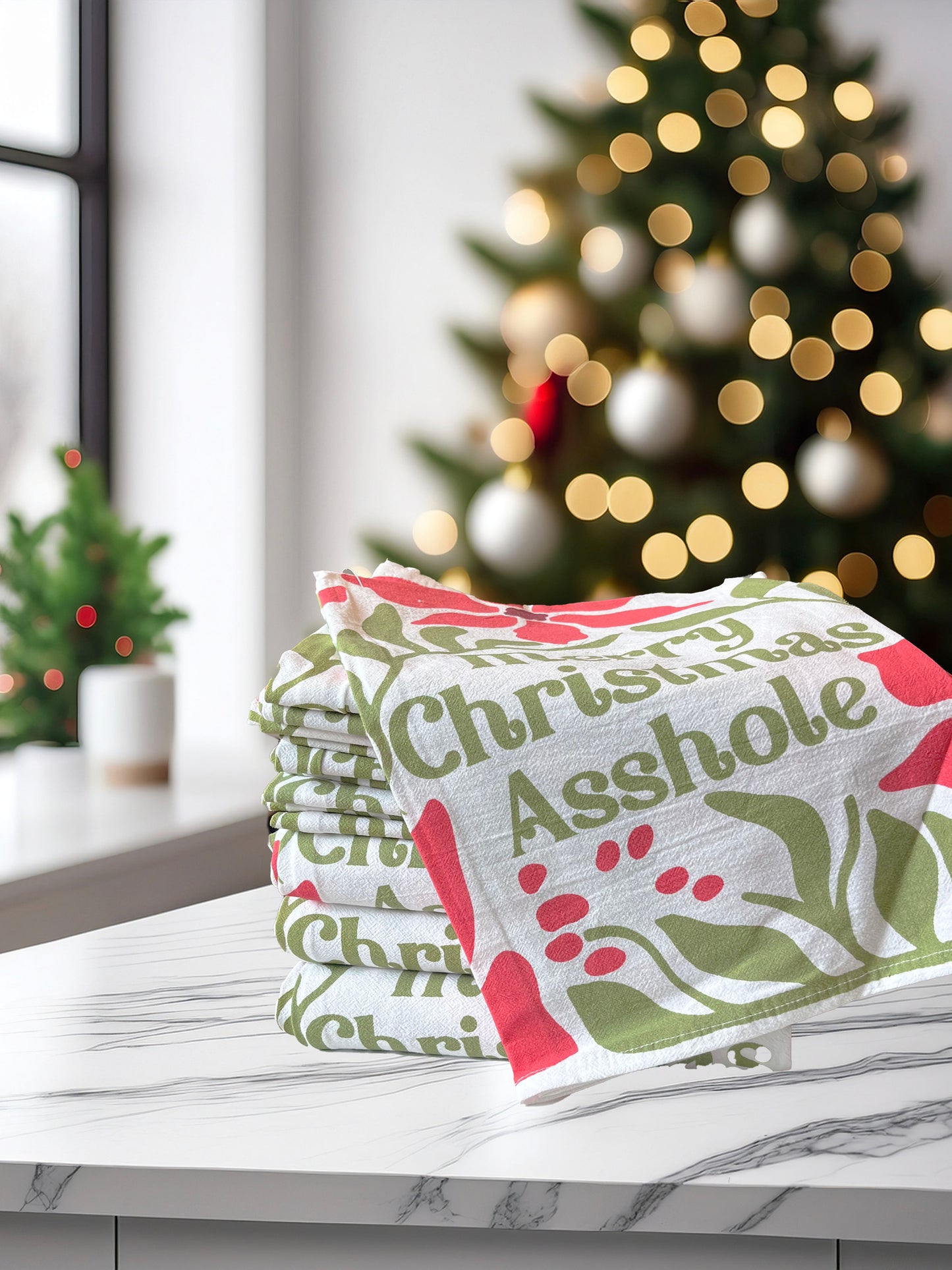 Merry Christmas Asshole towel with a festive background