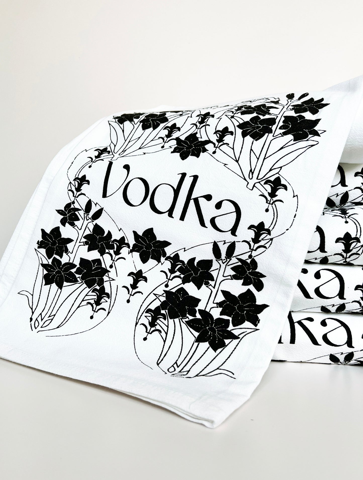 black and white screen printed vodka tea towel pretty retro floral design decorative cotton towels for home bar coin laundry montana
