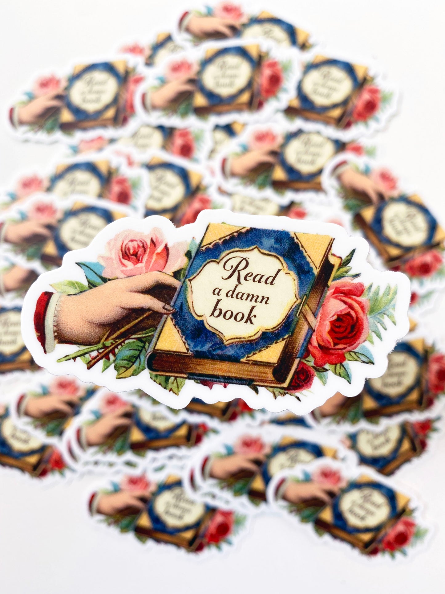pretty sticker read a damn book flowers with a book says read a damn book funny stickers coin laundry montana