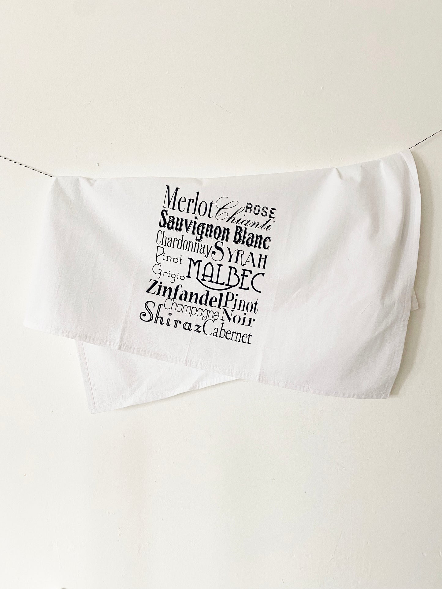 decorative bar towel wine words written in different fonts merlot rose sauvignon blanc syrah zinfandel pinot shiraz cabernet screen print kitchen towel coin laundry