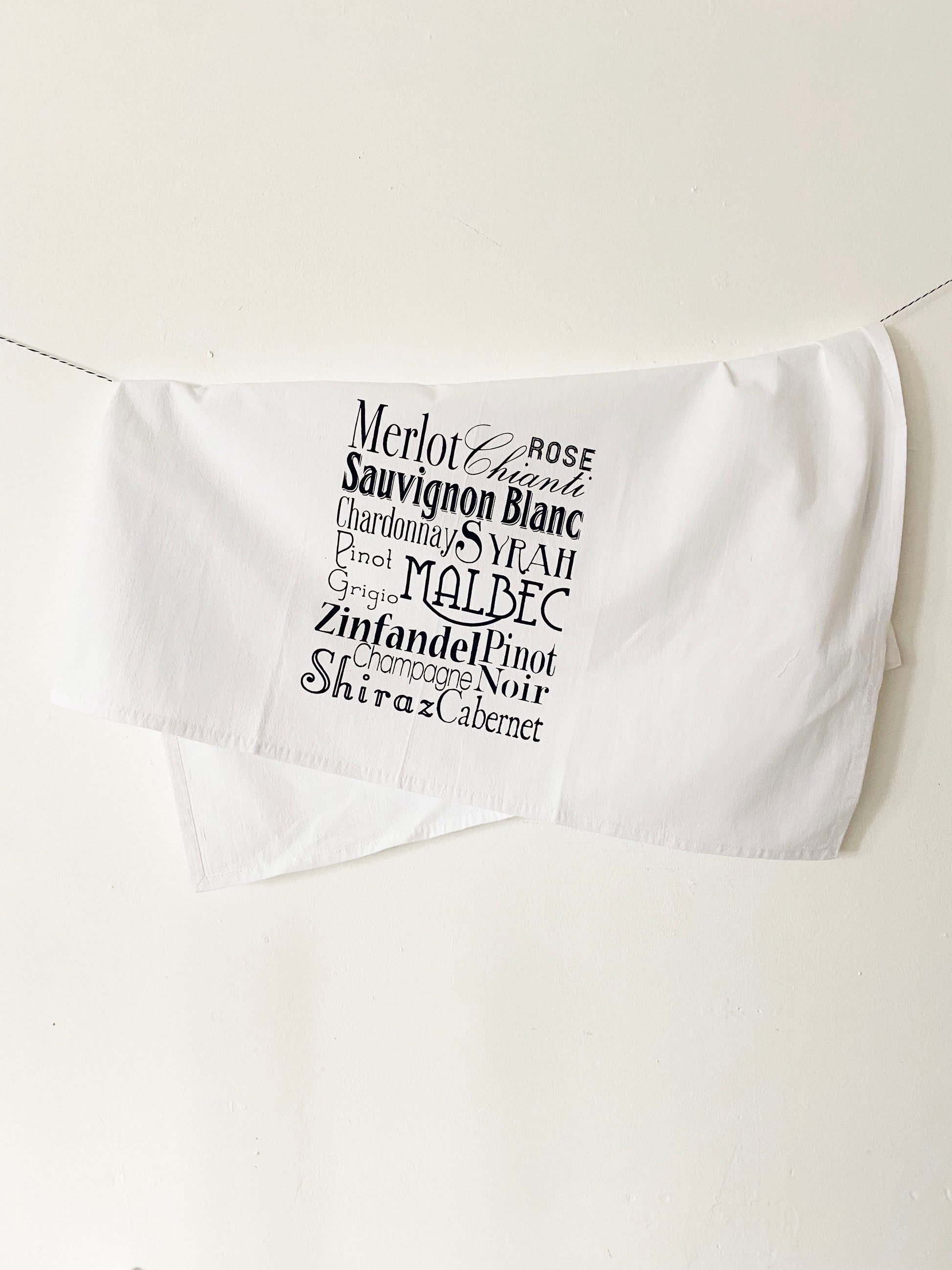 decorative bar towel wine words written in different fonts merlot rose sauvignon blanc syrah zinfandel pinot shiraz cabernet screen print kitchen towel coin laundry