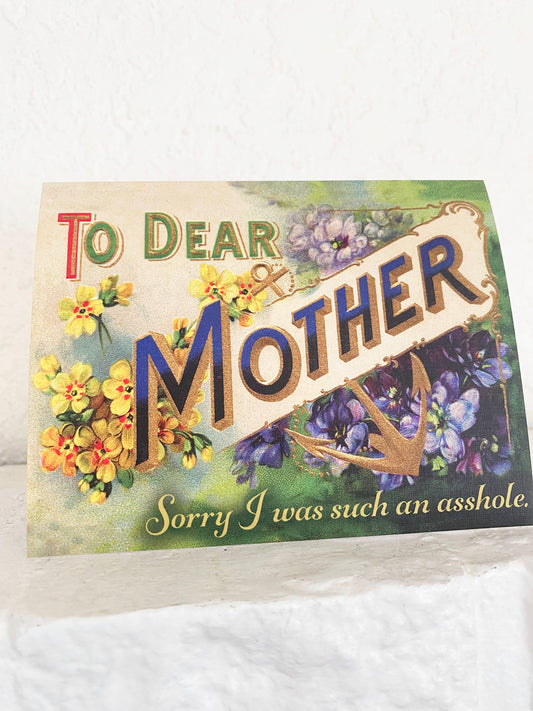 Victorian style card with purple and yellow flowers and an anchor with the text Dear Mother Sorry I was such an asshole