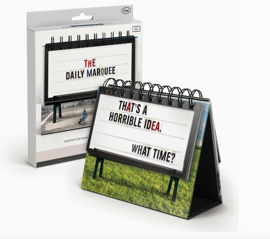 Desk calendar with quote 'That's a horrible idea. What time?' in front of packaging