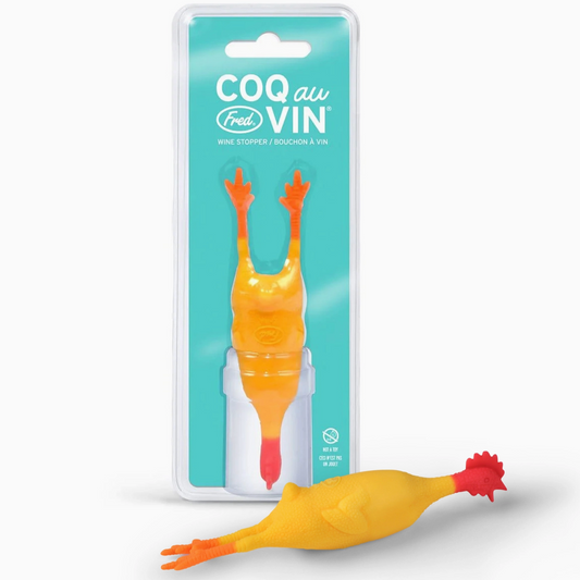 A novelty wine bottle stopper shaped like a rubber chicken shown both inside its teal blister packaging and lying loose in front on a white background.