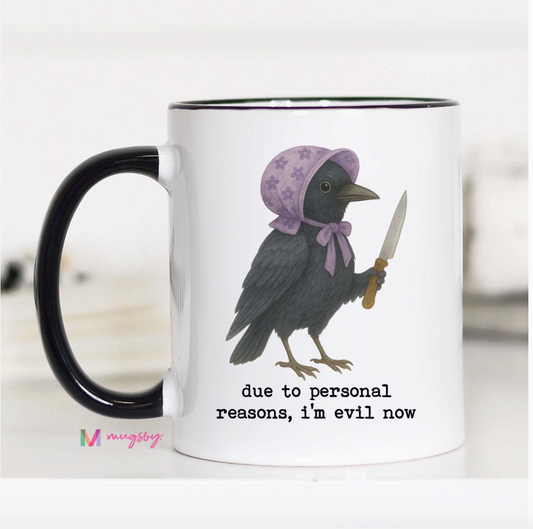 Mug with a crow wearing a bonnet and holding a knife, with text 'due to personal reasons, i'm evil now' on a white background.