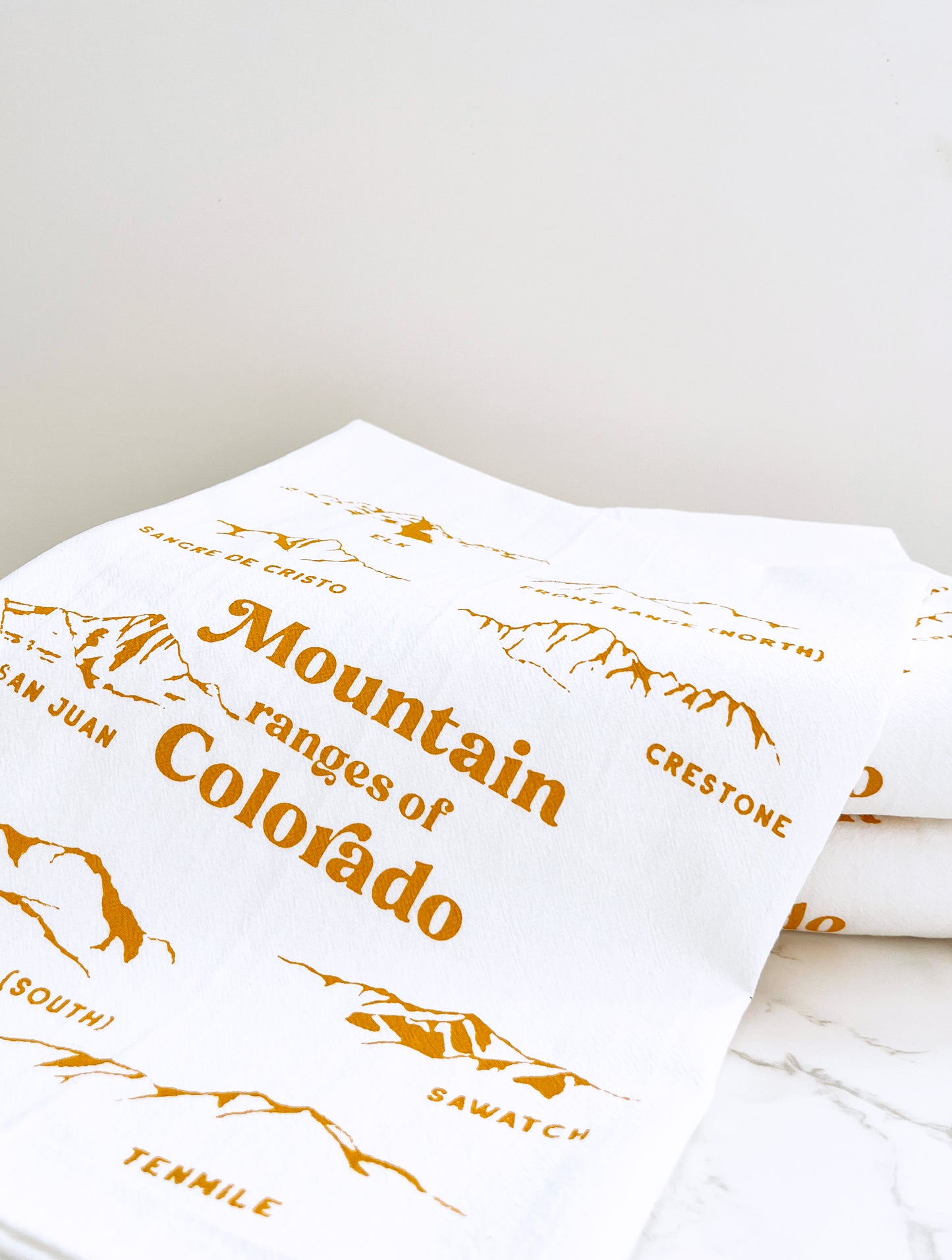 souvenir retro vintage style mountain ranges of colorado ochre screen print printed coin laundry hand illustrated