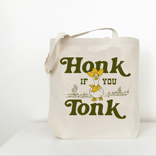 Tote bag with 'Honk if you Tonk' text and duck graphic on a white background