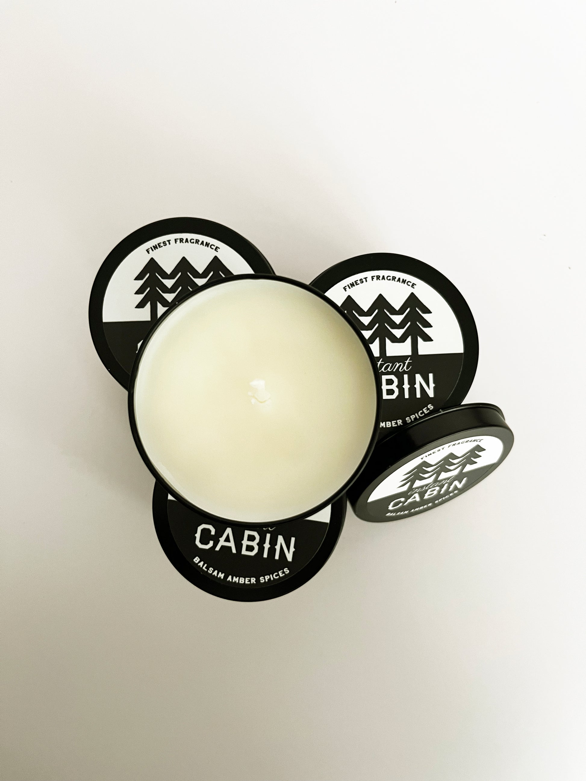 instant cabin candle tin travel black modern with pine tree scented balsam amber spice woodsy warm cozy scent coin laundry montana