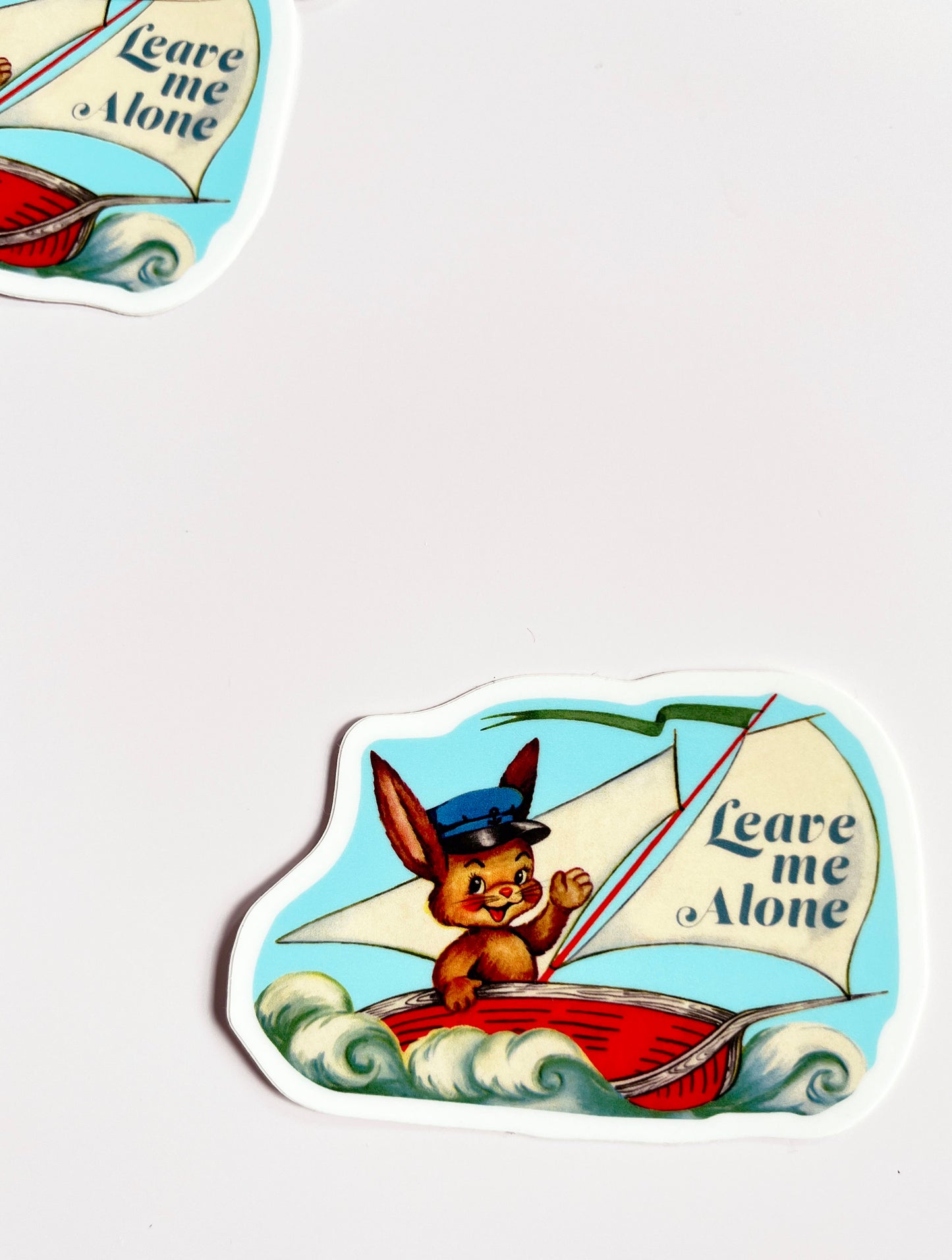 funny vintage style sticker with cute animal in a boat leave me alone fun stickers coin laundry montana 
