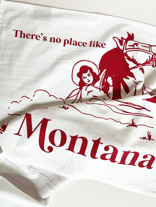 dish towel cowgirl riding horse mountains there's no place like Montana cotton kitchen towel screen print red ink coin laundry montana 