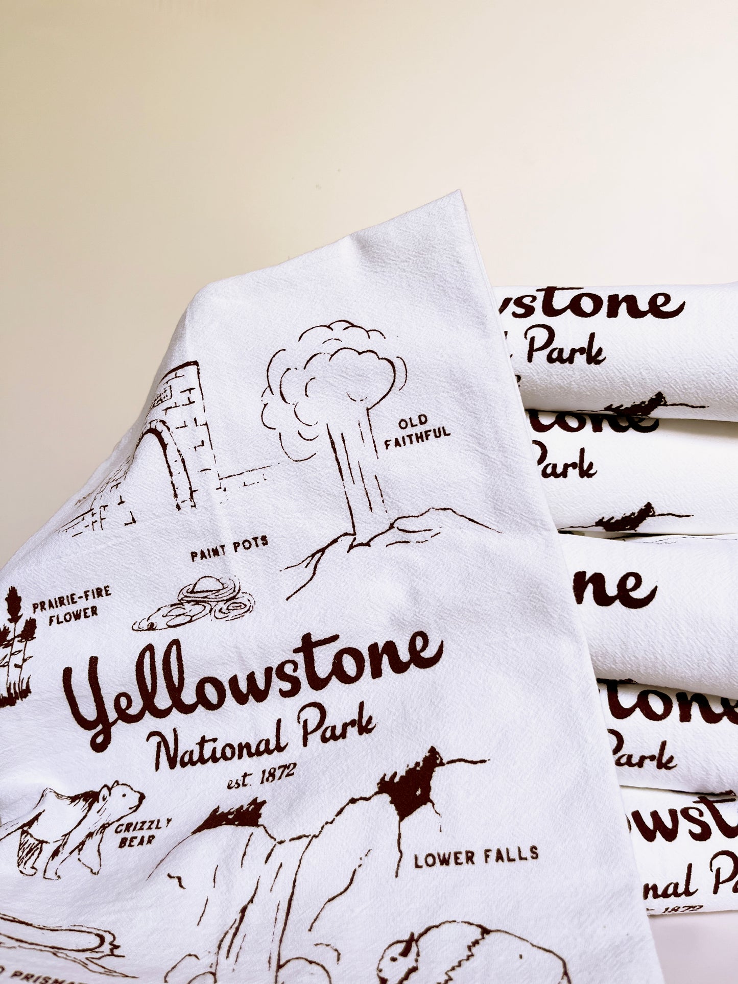 yellowstone national park tea towel brown screen print illustrations on white cotton kitchen towel coin laundry montana 