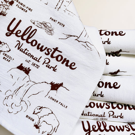 cotton dish towel yellowstone national park screen print brown ink hand drawn illustrations of bear bison waterfalls old faithful flowers Roosevelt arch souvenir tea towel fun screen print towels coin laundry montana  