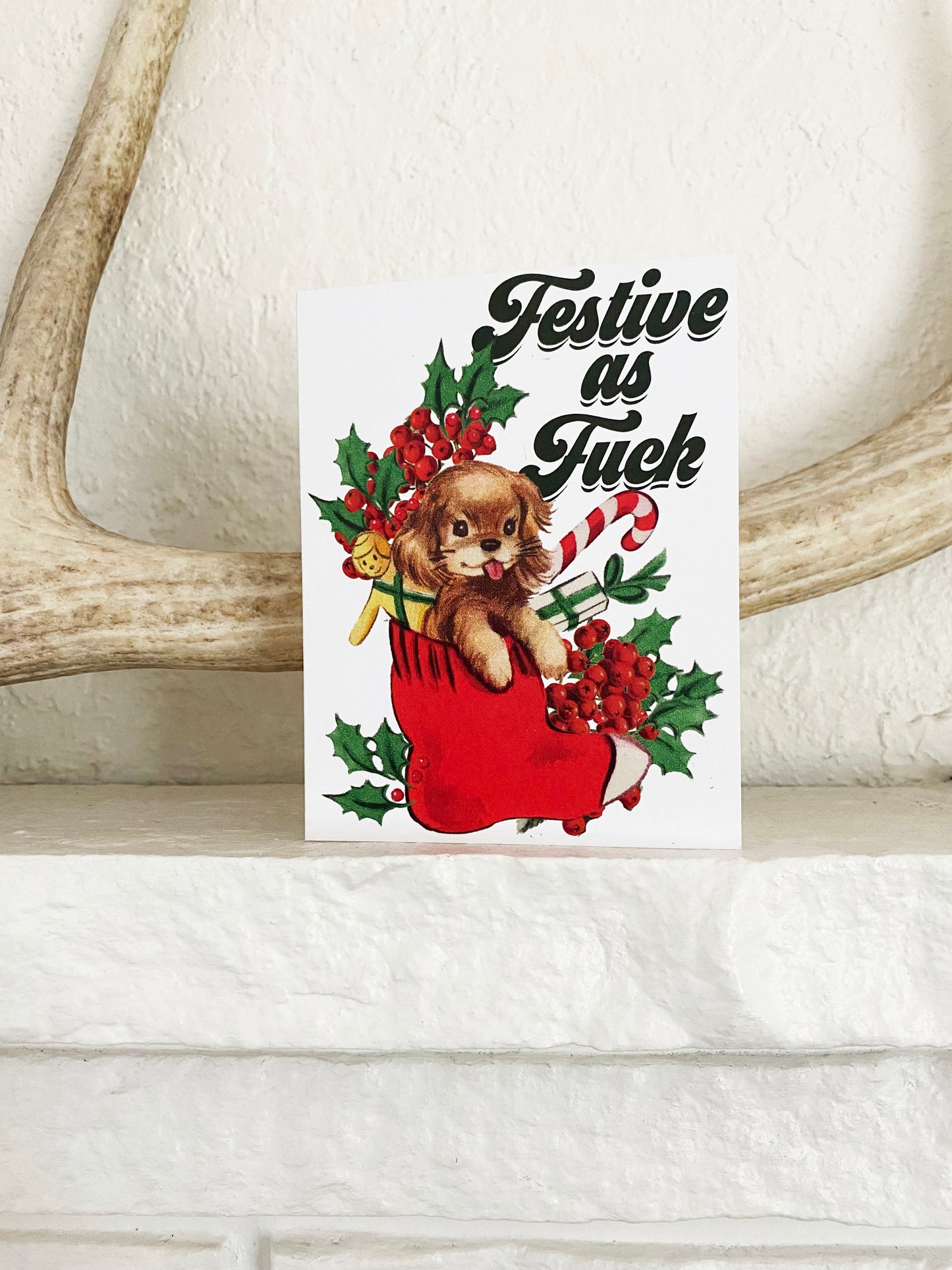 adorable puppy dog brown in a red stocking cute with candy cane funny christmas card holiday snarky festive as fuck with swear words coin laundry retro kistch kitschmas vintage christmas card