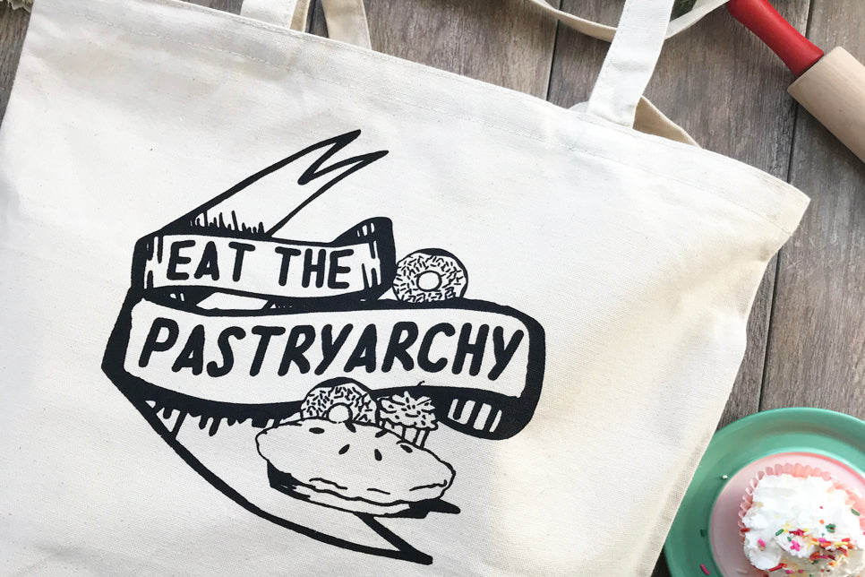 fun retro feminist patriarchy funny reusable bag with vintage style ribbon with text baked goods baking fun snacks coin laundry screen print
